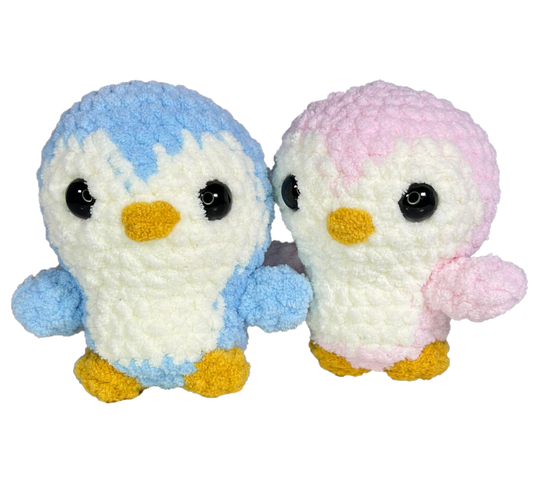 Penguin Crochet Dolls blue and pink standing together.