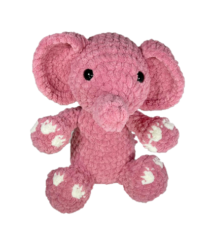 Pink crochet elephant from the front.