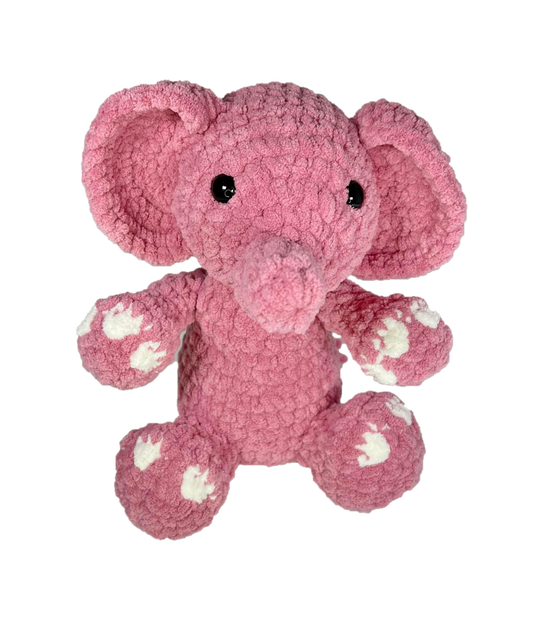 Pink crochet elephant from the front.