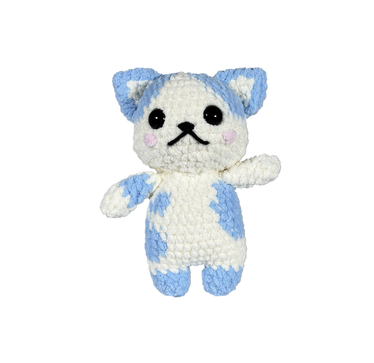 Blue and white crochet cat standing on 2 legs facing forward.