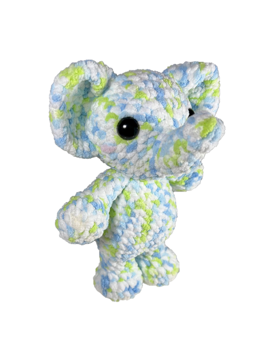 Blue green crochet elephant standing on its two hind legs.