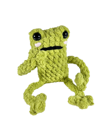 Light green crochet frog plushie in thinking pose.