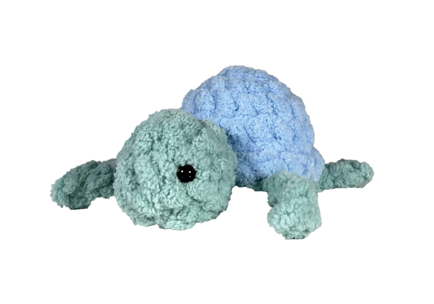 Green crochet turtle with a blue shell.