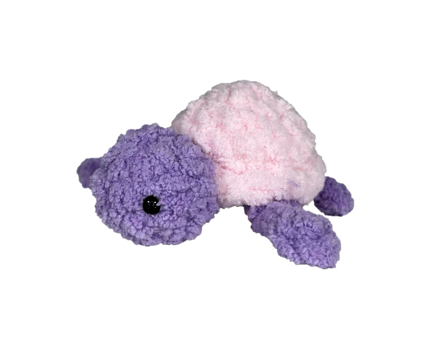 Purple crochet turtle with a pink shell.