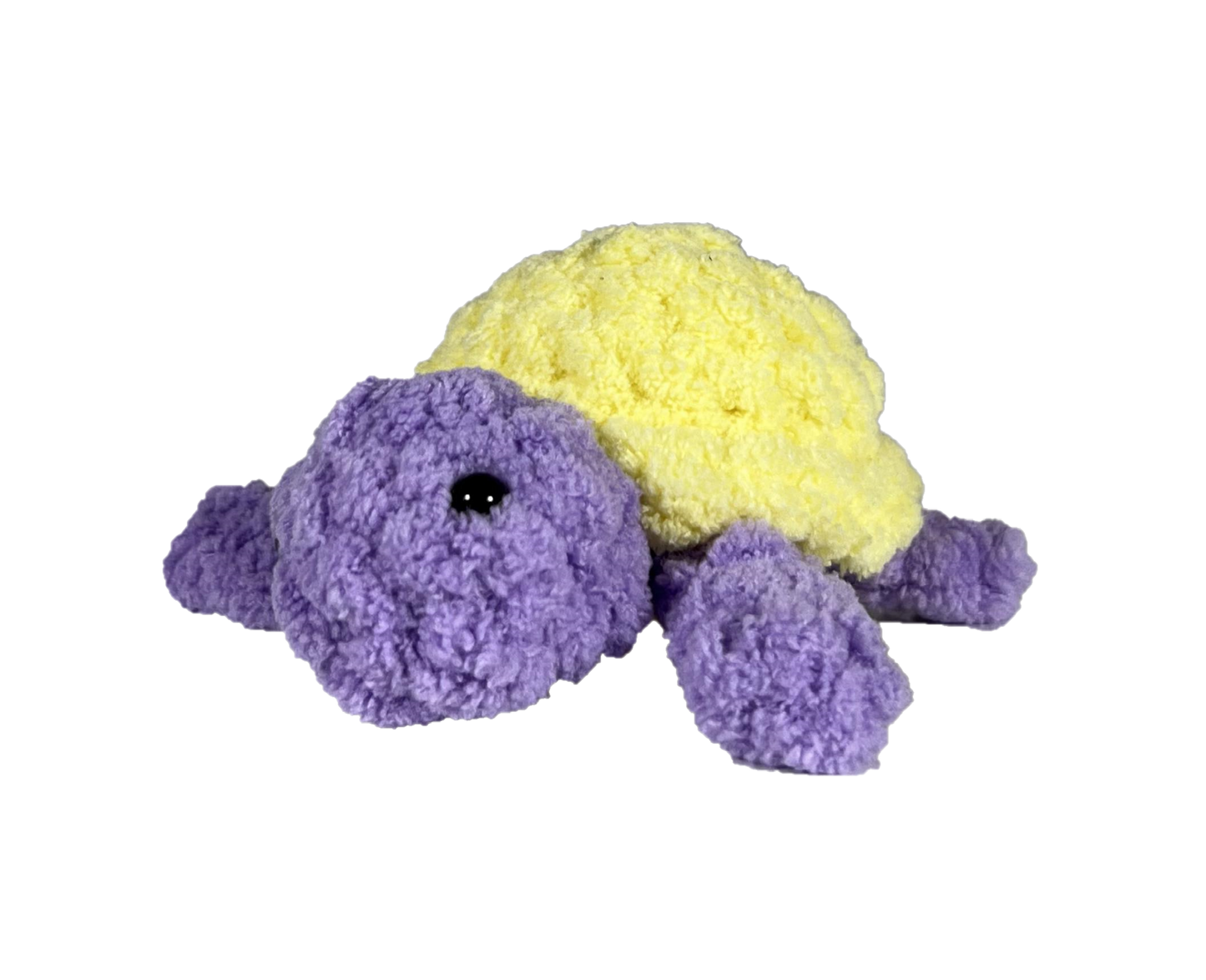 Purple crochet turtle with a yellow shell.