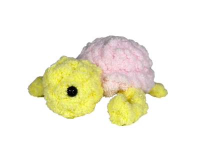 Yellow crochet turtle with a pink shell.